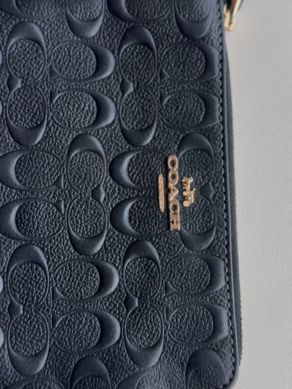 Coach Black Embossed Signature Wristlet with Gold Logo